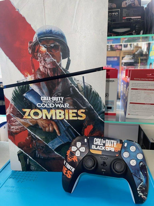 PS5 Slim Blu-Ray Edition Call of Duty Zombies Console with Call of Duty black Ops controller.